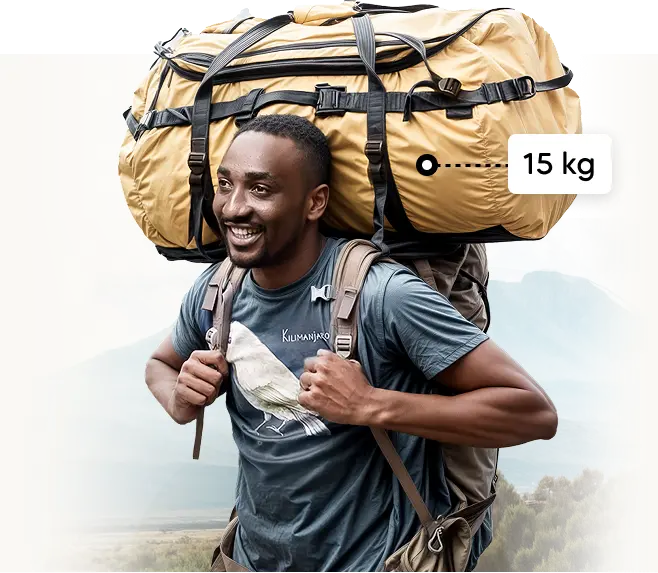 Porteur du Kilimandjaro transportant un sac de voyage d'expédition de 15 kg Porteur du Kilimandjaro transportant un sac de voyage d'expédition de 15 kg
